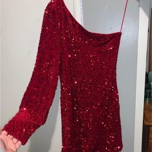 Size XL fits smaller, Red puff sleeve wore for a very few hours
